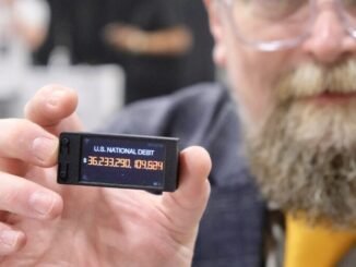 Why this Bitcoin-Friendly Lawmaker Carries a US Debt Clock in His Pocket