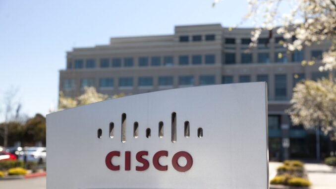 Cisco AI router solves data centre interconnect challenge "San Jose, United States - February 11, 2013: A large Cisco Systems sign sits outside their headquarters located at 400 Tasman Dr. in San Jose California. Cisco Systems is a multinational company that produces computer networking equipment."