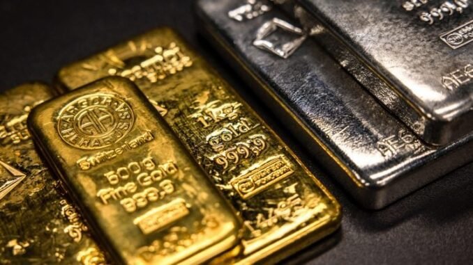 Silver tops $100 as gold nears $5,000 on extraordinary metals Silver tops $100 as gold nears $5,000 on extraordinary metals rally